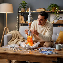 Lego moc fusée décollage modèle détaillé en blanc et orange avec moteur illuminé en lego moc saturn v rocket