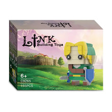 Figurine lego moc link avec cheveux jaunes tunique verte et bouclier bleu inspirée de breath of the wild