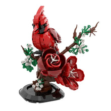 Lego moc oiseaux un cardinal rouge vif en lego sur une branche avec fleurs et feuilles vertes animaux volants