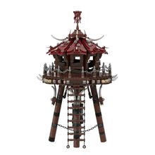 Détail d’une tour pagode lego moc rouge et marron avec cornes blanches chaînes et échelle dans zelda botw bokoblin