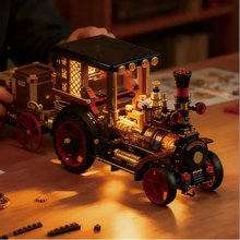 Lego moc voiture vapeur vintage en laiton et noir avec roues rouges composants mécaniques détaillés éclairage intérieur