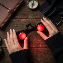 Lunettes halloween à yeux rouges lumineux avec monture noire et verres circulaires rouges lumineux brillants