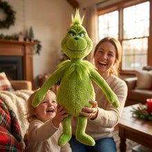 Peluche lutin vert grognon de noël avec texture duveteuse et cheveux hérissés pour décoration festive