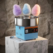 Machine à barbe à papa bleu avec bol inox et trois barbe à papa colorées pour préparation rapide