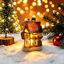 Maisonnette lumineuse de noël miniature à piles en céramique avec toit rouge et fenêtres éclairées chaleureusement