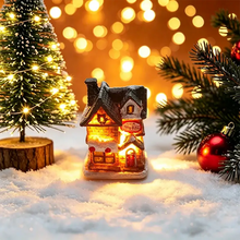 Maisonnette lumineuse de noël miniature à piles en céramique avec toit noir et fenêtres lumineuses chaleureuses