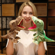 Marionnette à main dinosaure en peluche marron et verte avec dents jaunes pour aventures préhistoriques