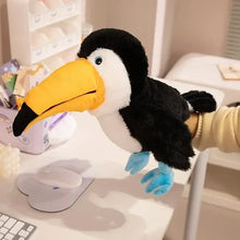Marionnette à main oiseau en peluche 35 cm avec corps noir et blanc, bec jaune expressif à animer, idéale pour petit théâtre