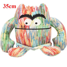 Peluche monstre multicolore de 35 cm avec motif crayon et grandes bouches idéale pour halloween