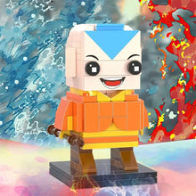 Figurine nanoblock avatar maître de lair représentant aang en style lego avec marques bleues et robes orange