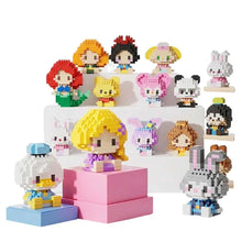 Une collection de figurines personnages disney colorées et pixelisées en briques nanoblock pour collectionneur