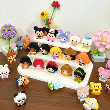 Une collection colorée de nanoblock figurines personnages disney en briques plastiques interlockées aux designs vibrants