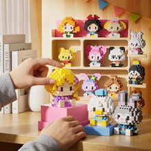 Figurine nanoblock personnages disney en style pixel avec cheveux jaunes, jupe violette et chaussures blanches