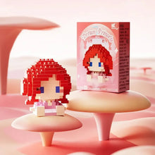 Figurine nanoblock personnages disney princesse rousse assise sur base champignon rose en blocs plastiques