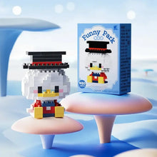 Figurine nanoblock personnages disney de donald duck pixelisé en blocs colorés avec haut de forme noir et tenue bleu jaune