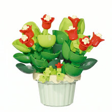 Nanoblock mini fleur rouge et verte dans un pot blanc nervuré idéal pour magasins de jouets et déguisement carnaval