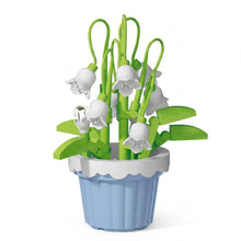 Nanoblock mini pot en lego bleu clair avec une délicate composition de fleurs blanches pour magasins de jouets