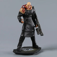 Figurine nemesis t-type en pvc de 11.5 cm noire avec personnage musclé et balafres portant un gilet tactique et une arme