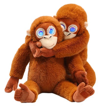 Peluche orang-outan interactive 40 cm orange avec yeux bleus lumineux et volume réglable en câlin doux