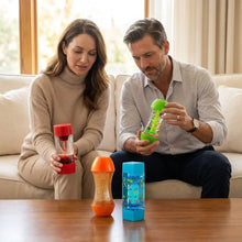 Pack 4 fidgets sensoriels anti-stress pour enfants avec bouteilles colorées transparentes et designs internes vibrants