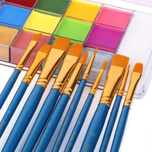 Set de pinceaux bleu à manche avec viroles dorées et poils orange devant une palette de maquillage artistique visage et corps 20 couleurs