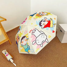 Parapluie automatique crayon shin-chan blanc avec motifs multicolores et fond clair sur la toile