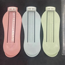 Pédimètre réglable en plastique pastel avec échelle coulissante et support talon pour mesurer le pied de bébé et enfant