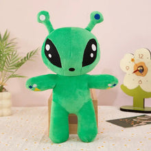 Peluche alien vert 30cm en peluche verte avec yeux noirs, antennes et petits points bleus sur les oreilles