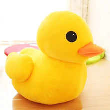 Pluche canard jaune géant en peluche avec œil noir et bec orange doux et moelleux