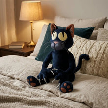 Peluche chat monstre noir avec yeux jaunes, griffes blanches et coussinets marron en velours doux
