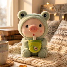 Peluche cochon cosplay animaux verte douce avec capuchon grenouille tenant une tasse avocat vert clair