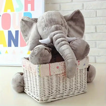 Peluche éléphant géant 40cm en tissu doux gris avec défenses blanches et texture moelleuse