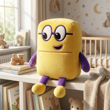 Peluche personnage chiffre modèle jaune avec forme rectangulaire et bras, jambes et lunettes violettes en tissu doux