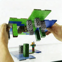 Plaque base magnétique minecraft en carton emboîtable vert, bleu et gris avec textures pixélisées pour puzzle