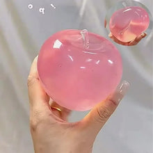 Pomme squishy souple à presser en forme de pomme translucide rose avec tige en verre clair pour relaxation