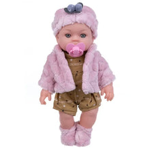 Poupon en vinyle de 30 cm avec déguisement carnaval rose incluant veste en peluche, bonnet gris et chaussons assortis