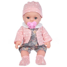 Poupon en vinyle 30 cm avec déguisement carnaval rose à pois en tricot, veste et chaussons assortis en magasins de jouets