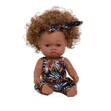 Poupon reborn à peau foncée en vinyle de 35 cm avec cheveux bouclés et combishort tropical noir et orange