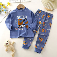 Pyjama enfant engins de chantier bleu à manches longues avec motifs véhicules de construction et build