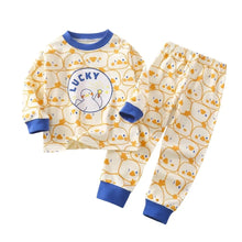 Pyjama enfant manches longues crème avec animaux jaunes et motif lucky central sur le devant