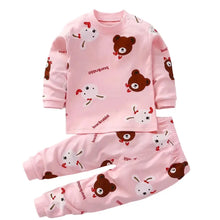 Pyjama enfant manches longues rose avec motif dours et lapins blancs à noeuds rouges pour enfant