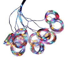 Rideau guirlande led usb avec télécommande comprenant des guirlandes led multicolores à fil noir enroulé