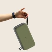 Sacoche rigide olive compatible nintendo switch avec 14 emplacements pour jeux et fermeture zippée noire