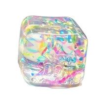 Jouet sensoriel needoh en résine translucide cube arc-en-ciel avec ruban holographique et confettis brillants
