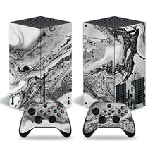 Console xbox series x avec skin marbre noir et blanc et manettes assorties motifs colorés peau xbox series