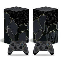 Skin xbox series x noir avec motifs graphiques dorés et design étoilé pour console et manettes