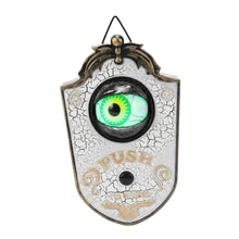 Sonnette décorative halloween œil lumineux blanche et or avec iris vert éclatant en matière craquelée