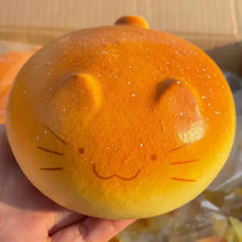 Squishy créature de la forêt en forme de petit pain orange et jaune avec finition brillante et paillettes subtiles