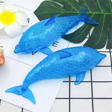 Deux squishy dauphin bleu translucide à surface cristalline en billes gélifiées pour un effet requin anti-stress