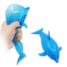 Squishy dauphin requin anti stress bleu en silicone translucide avec billes gélifiées pour soulager le stress